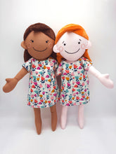Load image into Gallery viewer, Handmade rag doll with embroidered face and cotton lawn dress available as a sewing pattern and kit.