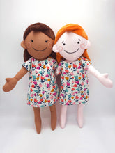 Load image into Gallery viewer, Handmade rag doll with embroidered face and cotton lawn dress available as a sewing pattern and kit.

